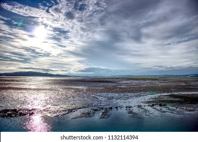 A beautiful shot of the Firth of Forth river at low tide taken from Cramond Island, close to Edinburgh in Scotland, United Kingdom. 