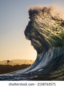 A Beautiful Shot Of A Huge Surf Wave On A Sunny Day