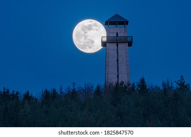 A Beautiful Shot Of A While Full Supermoon Behind The Tisnov City Observatory In The Czech Republic