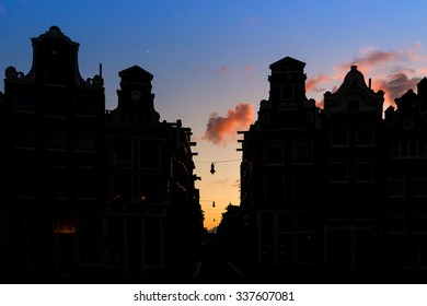 Beautiful Silhouettes Of Canal Houses At The Little Nine Streets In Amsterdam, The Netherlands, At Sunset