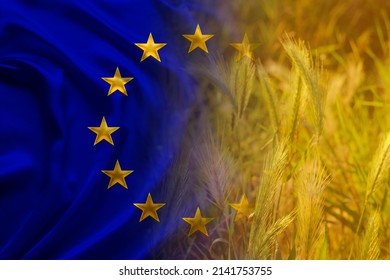 beautiful silk background, flag of European Union, golden ripe ears of wheat, concept of rich harvest of bread, grain import, export abroad, stock exchange, grain trading, Grains Futures Prices