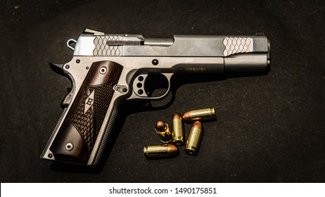 Beautiful Silver Handgun With Ammunition