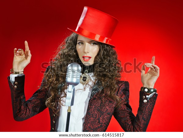 beautiful-singer-red-hat-microphone-on-stock-photo-614515817-shutterstock