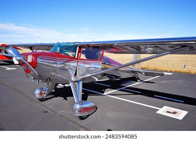 A Beautiful Single Engine Airplane Parked at an Airport - Powered by Shutterstock