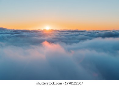 Beautiful Sky Backgound. Orange Sun Sets Behind Fluffy White Clouds. Amazing Sunset View Among Heaven. Beauty of Nature. - Shutterstock ID 1998122507