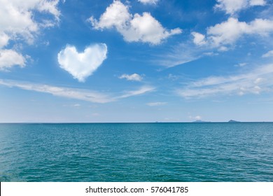 Beautiful sky and blue ocean. Iceland with heart cloud.
