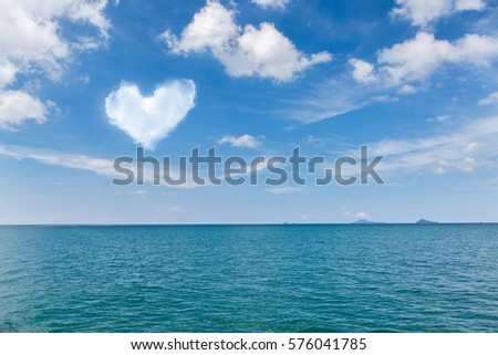 Beautiful sky and blue ocean. Iceland with heart cloud.