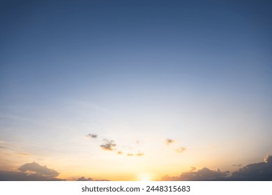 Beautiful sky and cloud at high. Include space, light of nature, sunset, sunrise. Colorful with yellow, orange and blue color at evening time in autumn for scene, backdrop, background and wallpaper.
