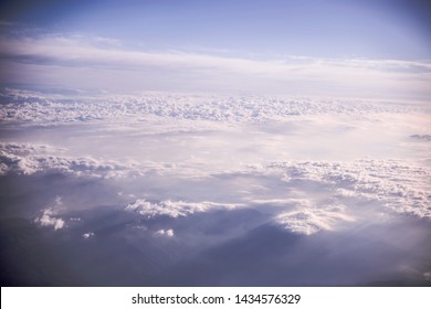 Beautiful Sky And Clouds. Eart View From Airplane. Mountains.