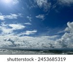 Beautiful sky and clouds over the ocean in Galveston Texas.