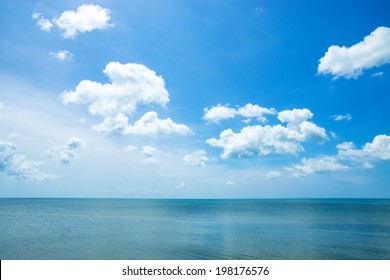 Beautiful sky and sea with white clouds.