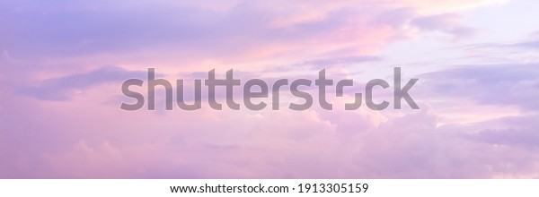 Beautiful sky with soft sunlight in pink and purple. Panorama of the beautiful sky..