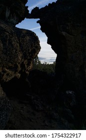 Beautiful sky through the gap in a rock formation