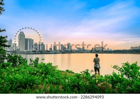 Beautiful skyline of Marina Bay, Benjamin Sheares Bridge and Singapore Flyer in Singapore. 
