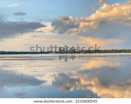 Beautiful skyline reflection over Bde Maka Ska, Minneapolis, MN.