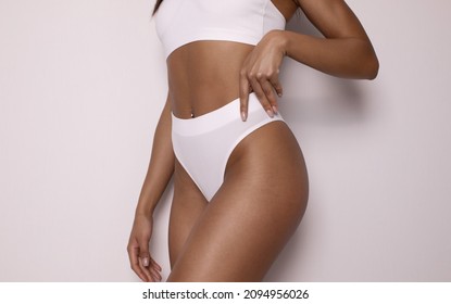 Beautiful Slim Black Woman Body With Tan Isolated On White Background