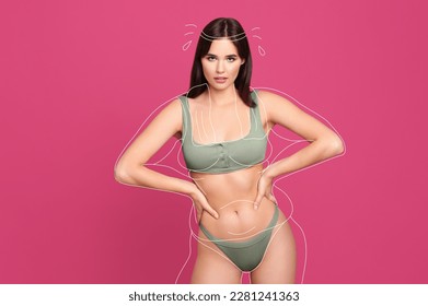 Beautiful slim woman in swimsuit on pink background. Outline with towel and sport headband during training as her overweight figure before workout - Shutterstock ID 2281241363