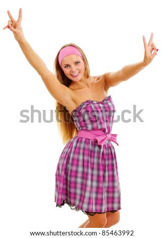 Beautiful smiling barbie girl in pink dress and headscarf showing victory symbol isolated on white background. Mask included
