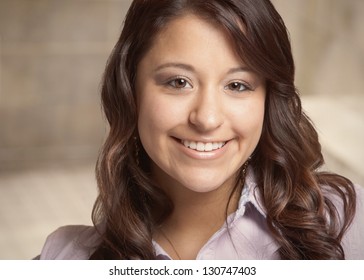 Beautiful smiling mixed race young woman closeup - Shutterstock ID 130747403