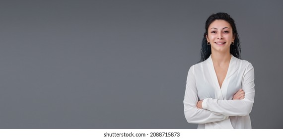 Beautiful Smiling Turkish Young Woman, Crossed Arm With Confident Mood Portrait. Includes Copy Space.