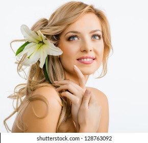 Beautiful Smiling Woman With A Lily