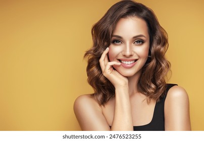 Beautiful smiling woman with medium length wavy hair .Happy girl curly hairstyle  and positive emotions .On a yellow background.  Beauty ,makeup and cosmetics . Expressive facial expressions - Powered by Shutterstock