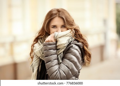 Beautiful Smiling Woman In Puffer Jacket Outdoors