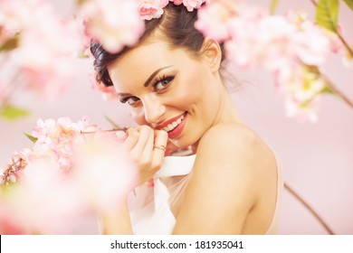 Beautiful Smiling Woman With Spring Flowers