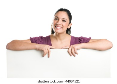 Beautiful Smiling Young Woman Holding A Blank Signboard To Write It On Whatever You Want!