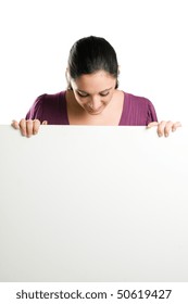 Beautiful Smiling Young Woman Holding A Blank Signboard To Write It On Whatever You Want!