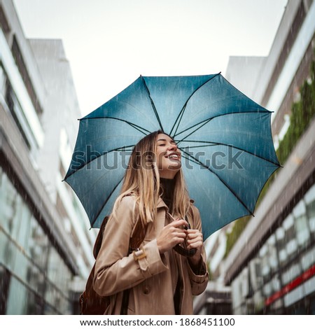 Similar – Blonde thin woman with hat and sunglasses visiting the city during the day.