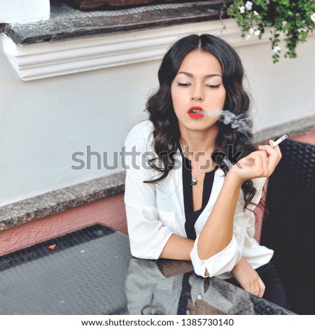 Similar – Image, Stock Photo smoke Young woman portrait