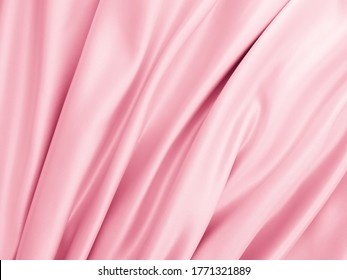 Beautiful Smooth Elegant Wavy Hot Baby Pink Satin Silk Luxury Cloth Fabric Texture, Abstract Background Design. Copy Space