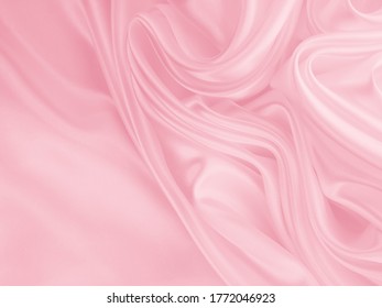 Beautiful Smooth Elegant Wavy Hot Baby Pink Satin Silk Luxury Cloth Fabric Texture, Abstract Background Design. Copy Space