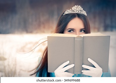 Beautiful Snow Queen Reading A Book - Portrait Of A Happy Beautiful Queen In Royal Dress Reading A Story Book