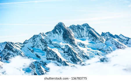 Beautiful snow-capped mountains against the blue sky - Powered by Shutterstock