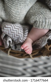 A Beautiful Soft Delicate Warm Young Baby Foot Photographed With A Shallow Depth Of Field. Gentle Calm Colours And Feel. Baby Care And Well Being. Babies Feet On A Cream Fur Rug.