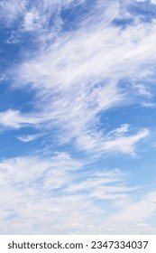 Beautiful soft gentle cloudy blue sky with white cirrus clouds, abstract background texture - Shutterstock ID 2347334037