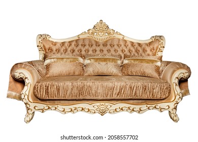 A beautiful soft sofa, upholstered in expensive brocade textile upholstery in light brown tones, with many soft pillows, with curved ivory carved legs, photographed from the front, isolated on a whit