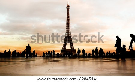 Beautiful soft-colored sky at dusk behind the Eiffel Tower in Paris.