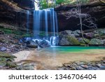 The beautiful Sougahoagdee falls and the blue waters of Bankhead National Forest