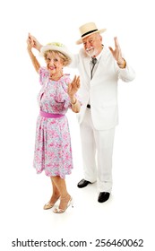 Beautiful Southern Senior Couple Dancing Together.  Full Body Isolated On White.  