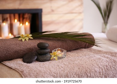 Beautiful Spa Accessories On Massage Table In Room