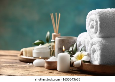 Beautiful spa composition with plumeria flower on wooden table. Space for text - Shutterstock ID 1655543683