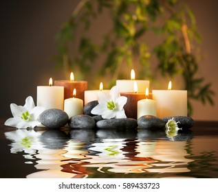 Beautiful spa composition with reflection on water surface - Powered by Shutterstock