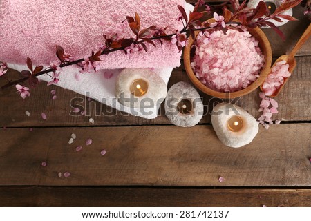 Beautiful spa composition with spring flowers on table close up