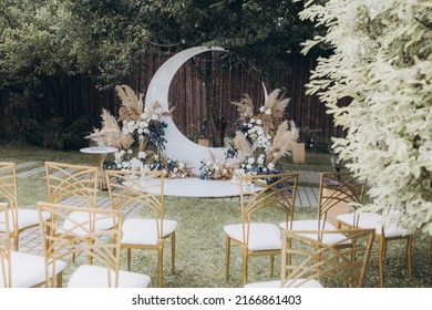 Beautiful Space Wedding Ceremony In The Summer Of A Chic Couple, The Groom In A Suit And The Bride In A White Luxurious Wedding Dress.