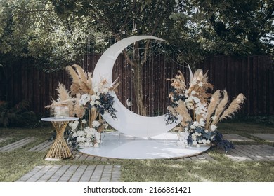 Beautiful Space Wedding Ceremony In The Summer Of A Chic Couple, The Groom In A Suit And The Bride In A White Luxurious Wedding Dress.