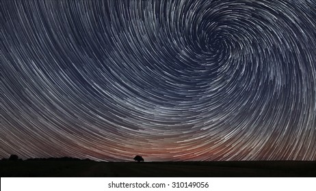Beautiful Spiral Star Trails over filed with lonely tree. Beautiful night sky.
Vortex star trails - Shutterstock ID 310149056