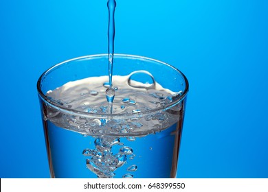 Beautiful Splash Of Blue Water In A Glass